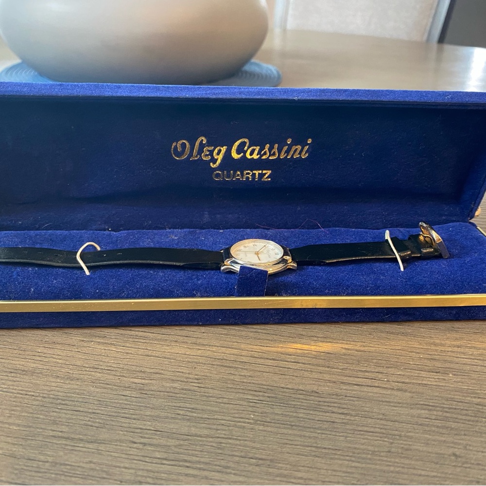 Oleg Cassini Gold and Black Quartz Watch